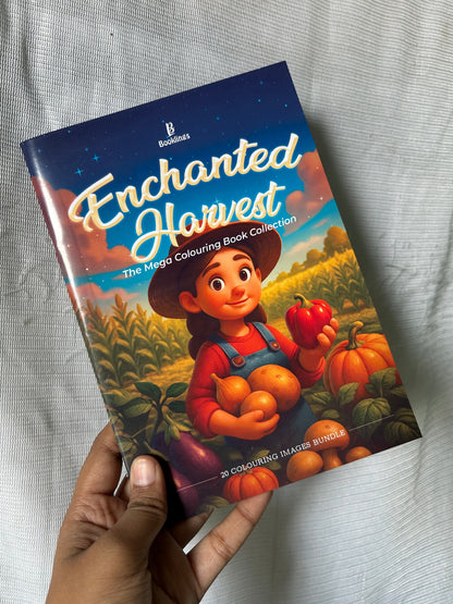 Book titled 'Enchanted Harvest' held by a hand on a light gray fabric background
